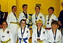 Dragon students return home with collection of medals despite tough competition