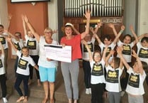 Delight as Bright Sparks receive cheque for £2,000