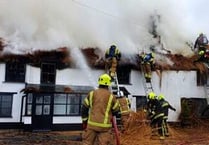 Road remains closed following huge village fire