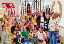 Drag queen delights audience during library story hour