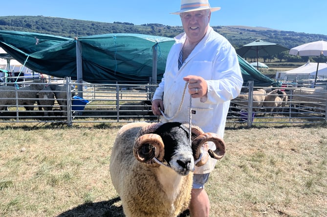 Stuart Cornelius stood with his Scotch Blackface sheep