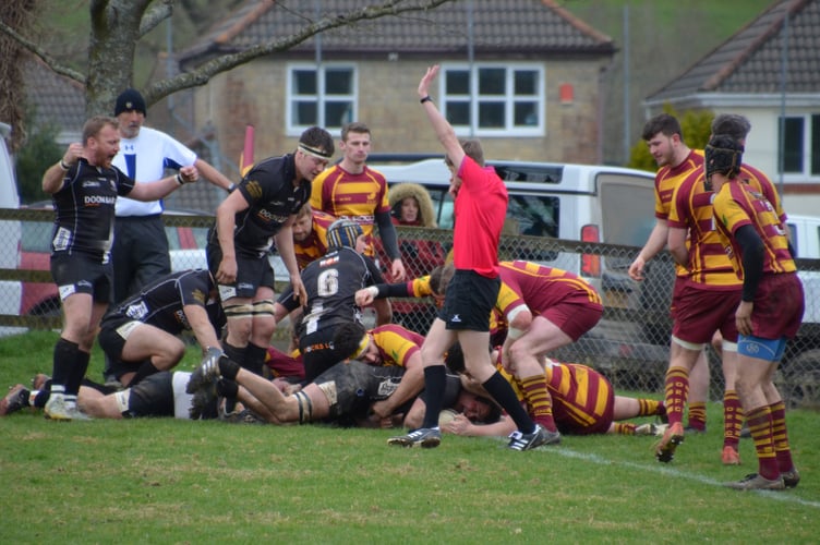 George Bone scores late on for Launceston at Okehampton in Regional One South West.