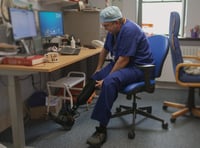 Surgeon charged with fraud after his legs were amputated