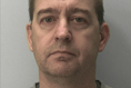 Jealous husband jailed for axe and knife threats