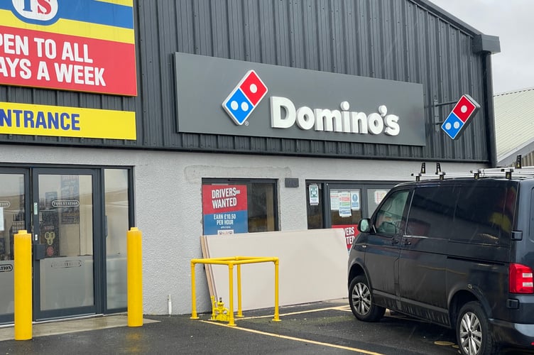 Dominos install signs at upcoming Launceston branch