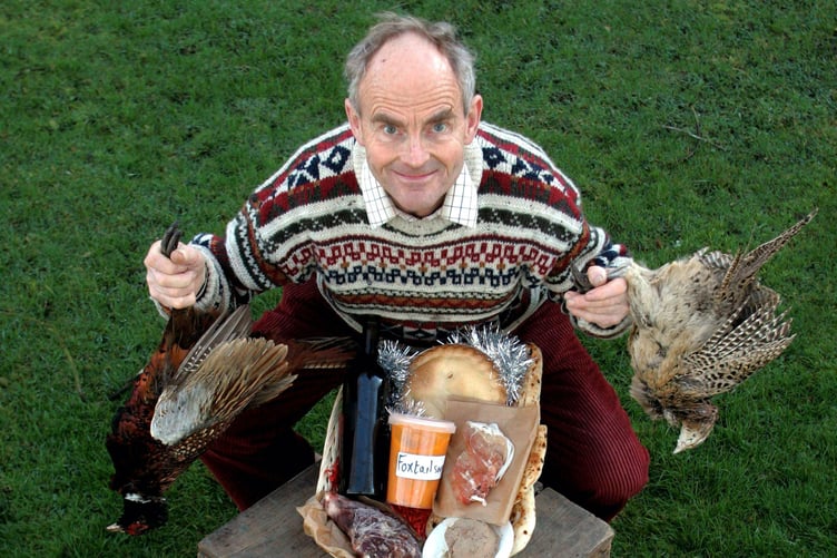 FILE PHOTO-Arthur Boyt with his 'Roadkill Christmas Hamper, 2005..See SWNS story SWPLmeat.A roadkill connoisseur famed for eating whale for his Christmas lunch is ditching the unusual habit in favour of a traditional turkey this year.Arthur Boyt, 80, had been dining on run-over animals for years - including rabbits, badgers and even RATS.His biggest 'catch' came in 2016 when a massive sperm whale washed up on a nearby beach and Arthur stuffed his freezer with enough to last years.Although he still has some whale in stock, Arthur, from Davidstow, Cornwall, will be going to his brother-in-law's for the festive day for a traditional turkey lunch.