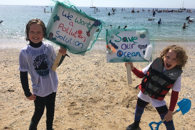 Two young supporters of the SAS mass paddleout at Gyllyngvase Beach, Falmouth (Image: Richard Whitehouse/LDRS)
