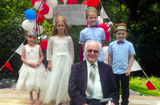 Mr Jack Davy, Honorary Member of Rilla Mill Village Hall and past chairman with the carnival royalty Queen Natalie, King Bobby with attendants Merryn and Harry Davy