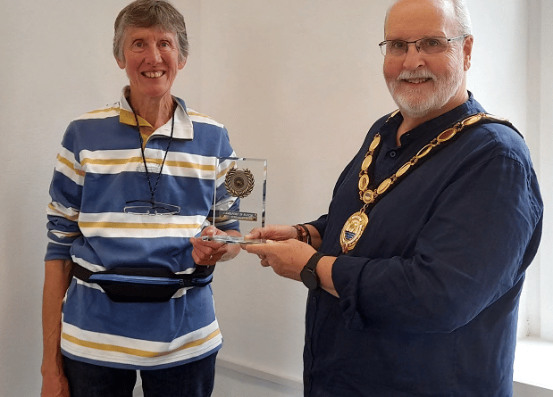 Patsy Deeley receives her trophy for best allotment from the Camelford Town Mayor Rob Rotchell. Pictures: Adrian Jasper