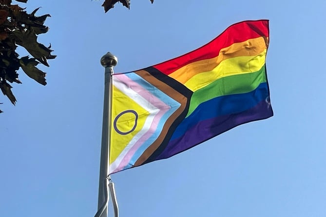 The pride progress flag on the town council flagpole this week.  AQ 6252