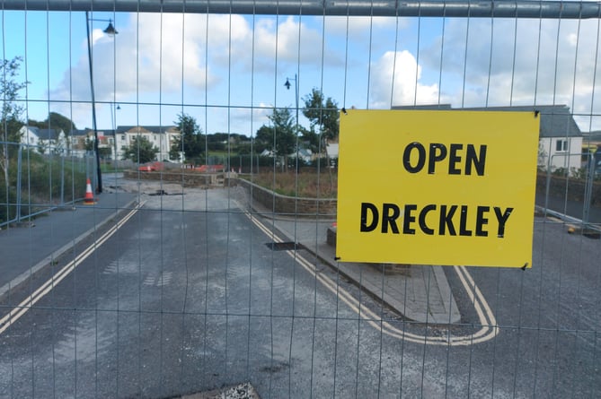 A sign affixed to the closed road on the Wainhomes development in Bodmin