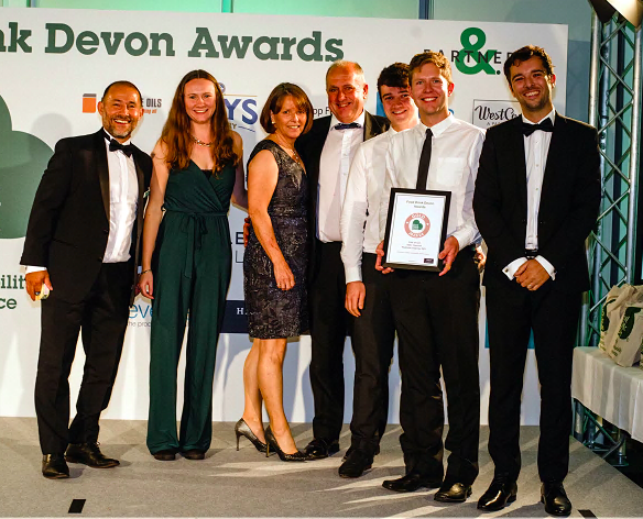The Alder Vineyards team collecting their two Gold awards at the Food Drink Devon Awards