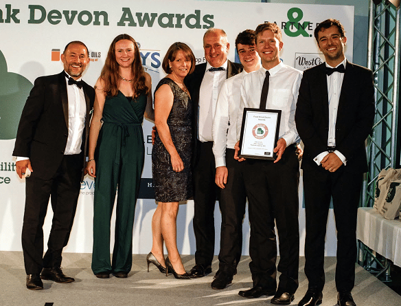 The Alder Vineyards team collecting their two Gold awards at the Food Drink Devon Awards