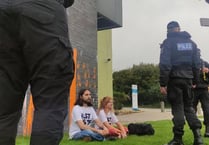 Just Stop Oil protestors cover Falmouth University in orange paint