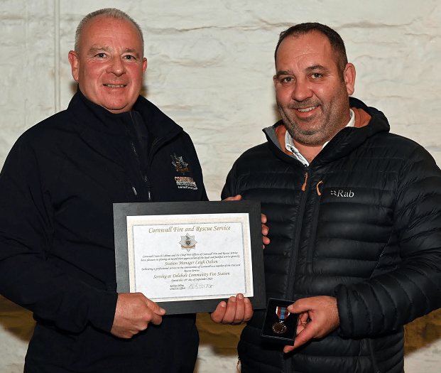 Firefighter hangs up his braces after 30 years in the service