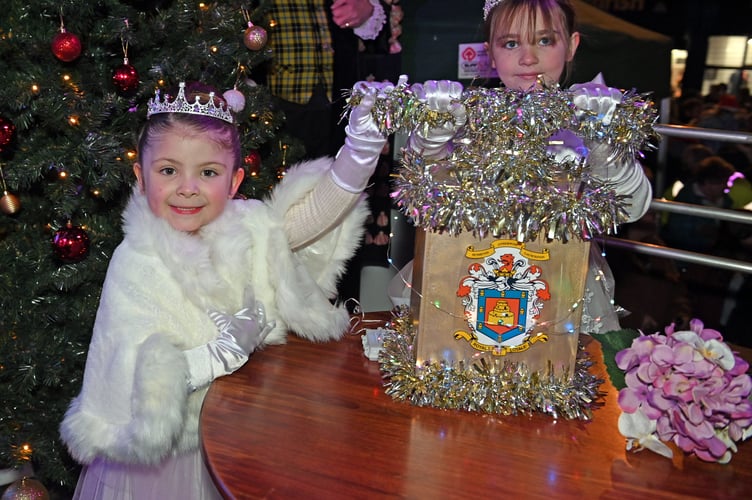 Given the honour of turning on the Christmas Lights are the Launceston Carnival Royalty Rafaela Holden (Attendant) and Jessica Heywood (Carnival Queen)