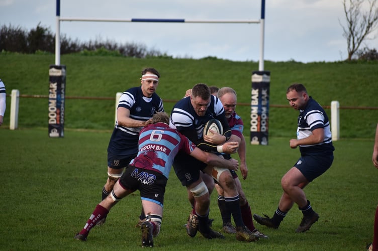 Bude's Finley Fry (6) and Jason Bolt make a tackle at Alexandra Road.
