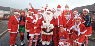 Santa run spreads Christmas cheer through town