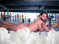 Pub strips off for Cancer Research