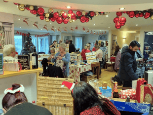 Residents, families, and staff enjoy residential home Christmas Fayre