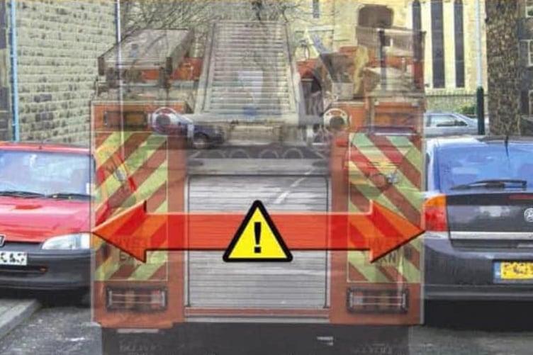 Gap between two cars not big enough for fire engine