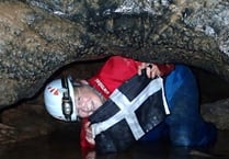 Cornish flag taken into the depths of cave system 