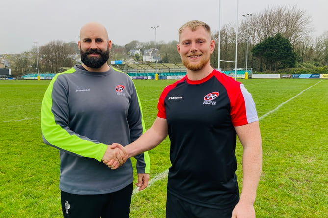 Cornish Pirates assistant coach Louie Tonkin (left) welcomes Hallam Chapman to the Mennaye Field.