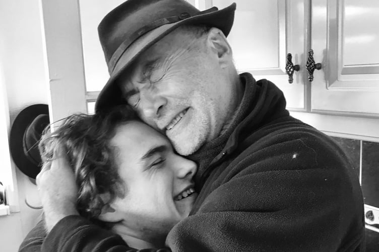 Paul Carey pictured with his son Owen celebrating his 18th birthday