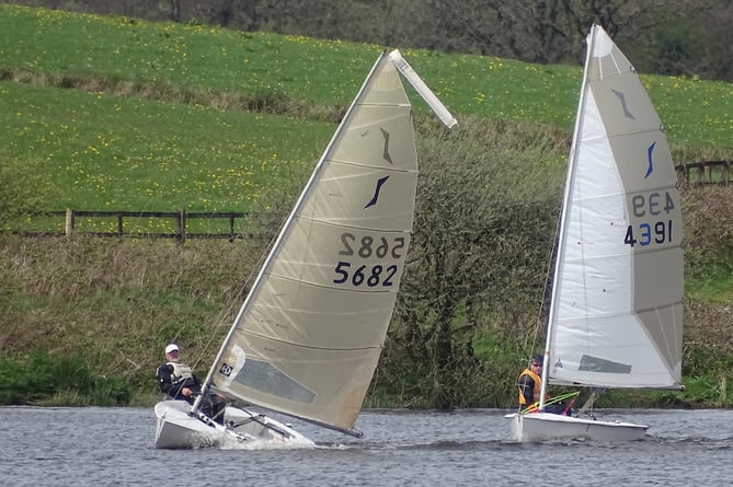 The gust has caught Adam Hilton's Solo but not yet Dave Perrett's at Upper Tamar Lake on Sunday.