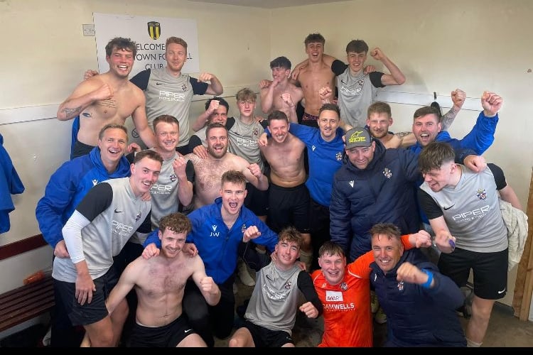 Bude Town Reserves celebrate winning the St PIran League Division Three East title at Looe Town Reserves on Saturday.