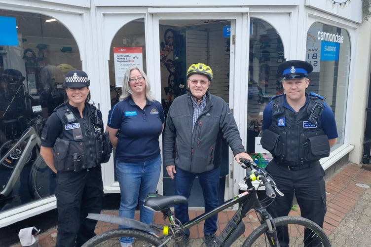 Wadebridge Police with staff at Wadebridge bike shop.