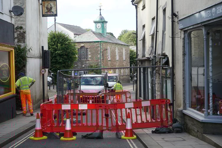 Workers from Cornwall Council owned Cormac setting up the closure on Fore Street in Camelford