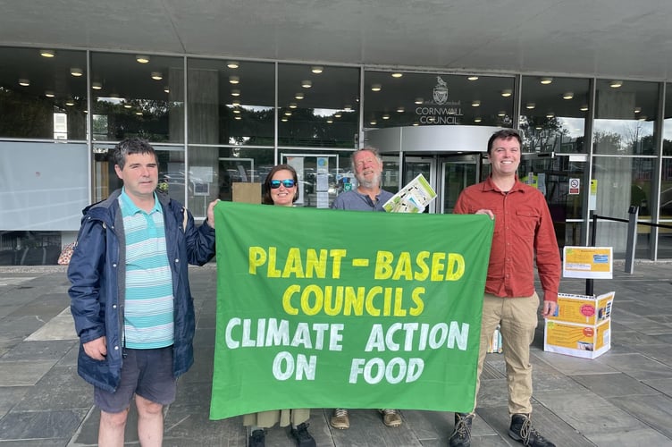 Local residents with a Plant-Based Councils banner outside New County Hall before the Full Council meeting