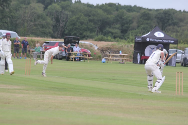 Sam Hockin, pictured bowling against St Austell last summer, took 7-32 from his 10 overs as Werrington saw off the same opposition by seven wickets on Saturday. (Picture: Paul Hamlyn).