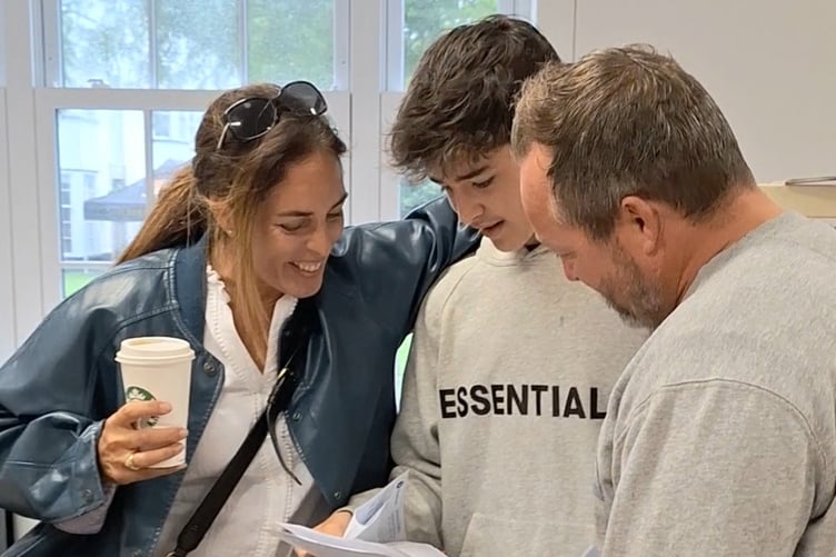 Jack Saltmarsh with his parents
