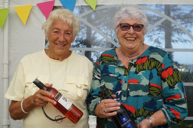 Big smiles from Liz and Sue on the tombola stall. (Picture: Adrian Jasper)