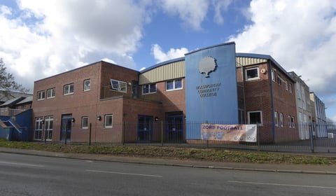 Officers attend reports of individual "making threats" outside college