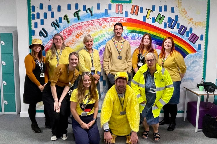 Callywith College staff in front of the Unity Rainbow (Picture: Callywith College)