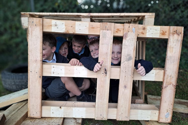 The loose parts section of the play areas has already proved successful, with children making dens to spend time together. (Picture: Holsworthy Primary School)