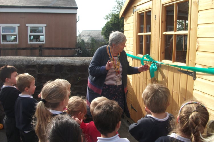 President of Launceston Rotary Club Margaret Young cutting the ribbon