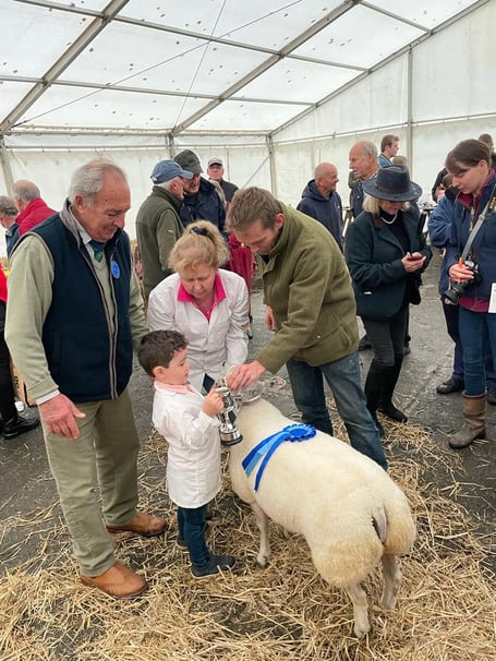 A YOUNG winner receives his trophy at a previous Primestock Show 