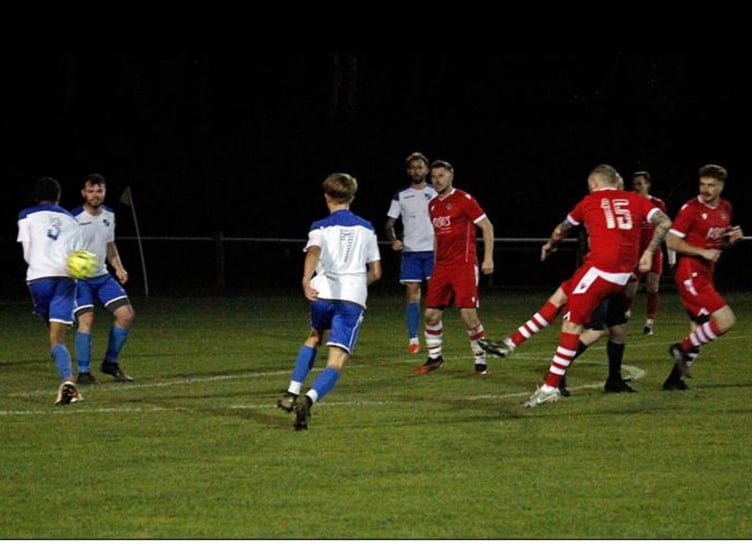 Bude Town debutant Joe Barker smashes home a superb shot from 25 yards to earn his side a point at Camelford on Friday night. Picture: Chris Pointer