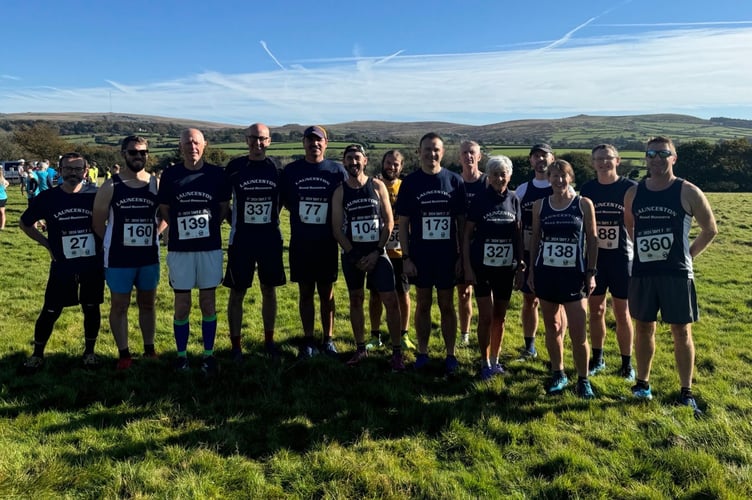 The majority of the Launceston Road Runners at the Tavy 7. From left: David Thomson, Eddie Thomson, Martin Hynes, Andrew Hosking, Mark Lancaster, Darren Evans, Joe Thomson, Andrew Simpson, Jon Kappes, Angela Brinicombe, Mark Jones, Jaine Hynes, Mark Simpson and Andy Berry. Picture: Launceston Road Runners
