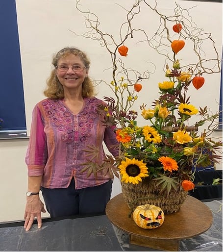 Fiona Hammond with her final arrangement from her display 'Flower Arranging with a difference: Floral Art on the Hoof' at Bude Flower Club