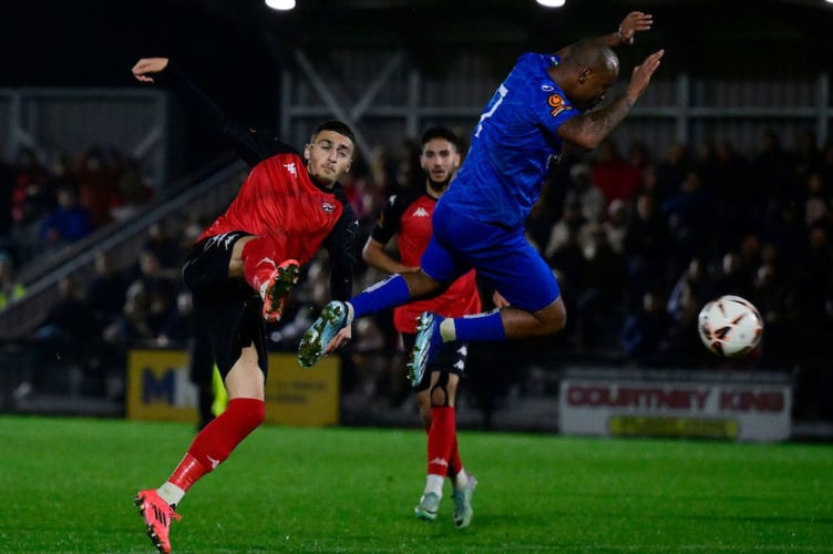 Truro City striker Jaze Kabia gets a shot at goal. Picture: Phil Mingo/PPAUK