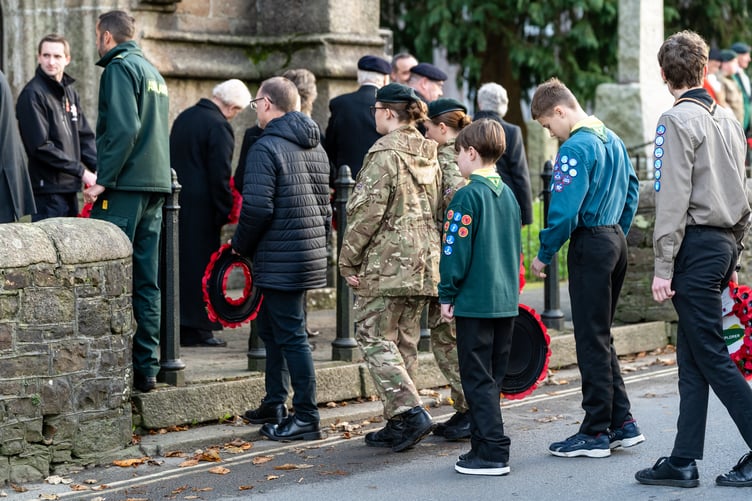 A queue of representatives from local organisations forms to lay wreaths. (Picture: Matt Willson/Passion4Photos)