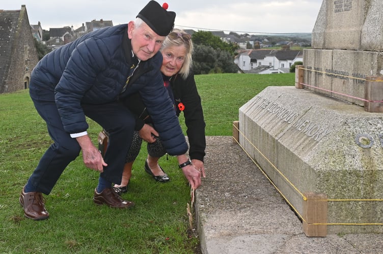 Keith and Patrica Cozens placing their Remembrance Crosses at the War Memorial