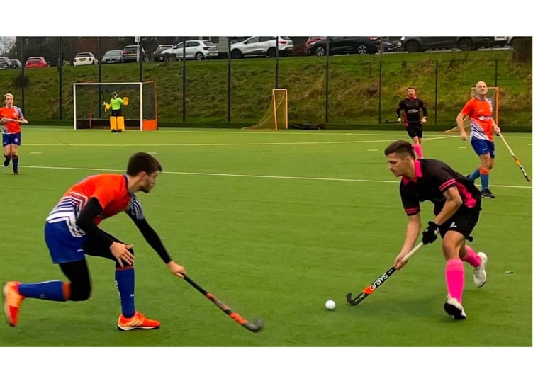 Charlie Falla uses his speed to help take the ball around the Ocean City player. Picture: Andy Davis