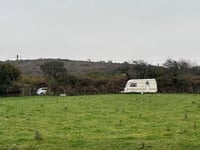 Emotional plea by young family to carry on living on their land