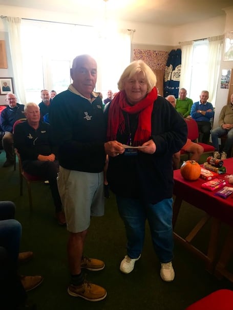 Bude and North Cornwall Golf Club Seniors section's captain Doug Holts' charity this year was Bude Food Bank. Pictured is Len Hancock presenting a cheque for £674 to Mrs Susan Jarvis of Bude Food Bank. (Picture: Gary Carter)